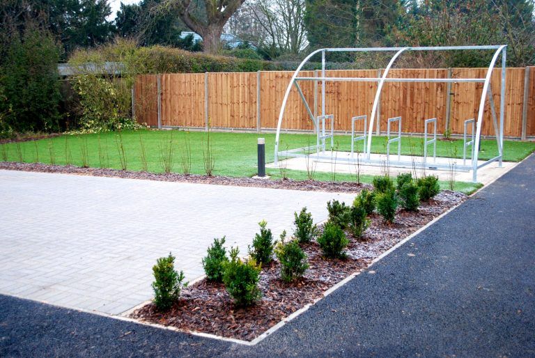Bicycle racks, car park, planting and landscaping